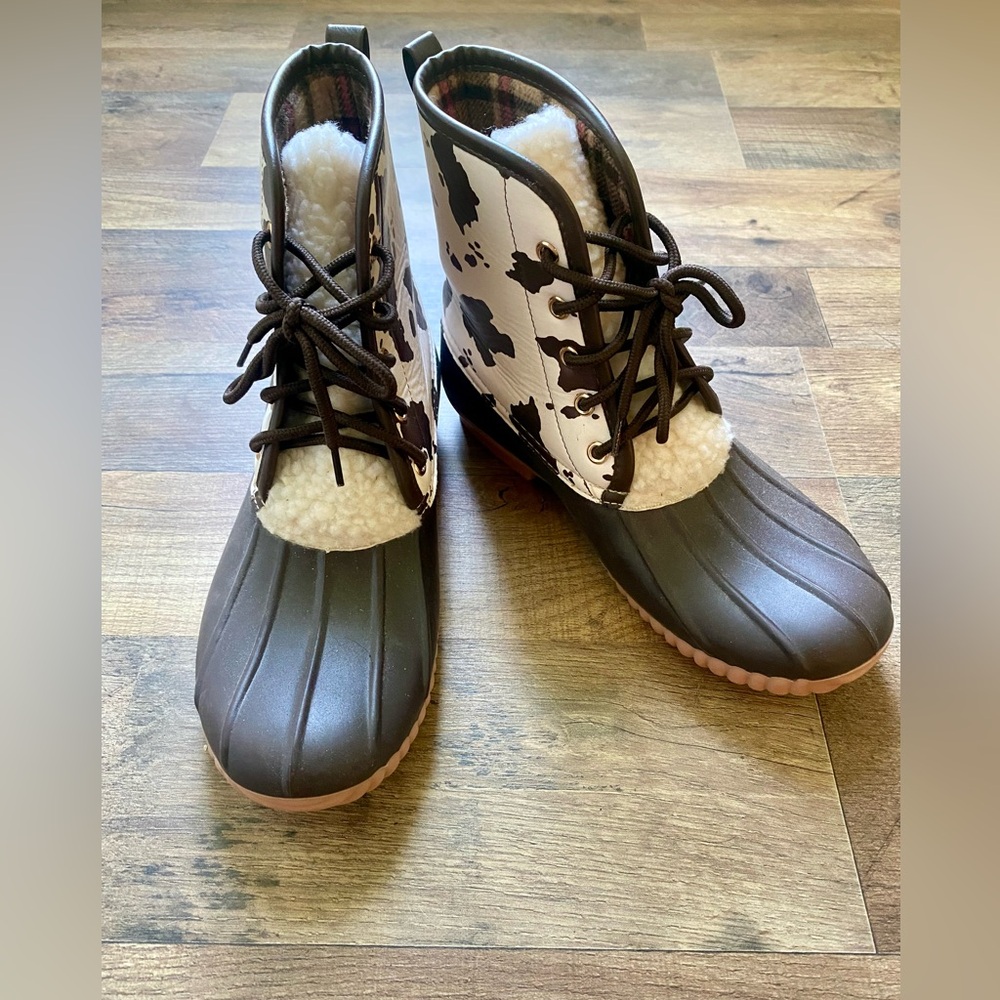Cow print duck boots